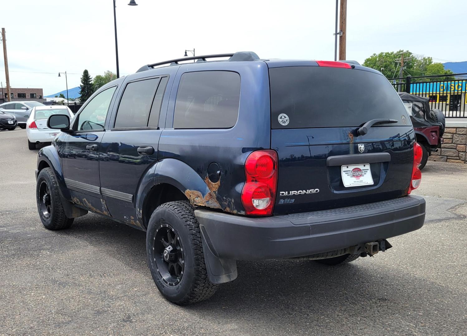 2005 Blue /GrAY Dodge Durango ST (1D4HB38N05F) with an 4.7L V8 engine, Automatic transmission, located at 450 N Russell, Missoula, MT, 59801, (406) 543-6600, 46.874496, -114.017433 - Looks a little rough but runs well. 4 Wheel Drive Works. 4.7V8 Engine. Automatic Transmission. 3RD Row Seating. Nice Wheels. Power Windows and Locks. Does have a Check Engine light on P0058. financing is NOT Available. - Photo#6